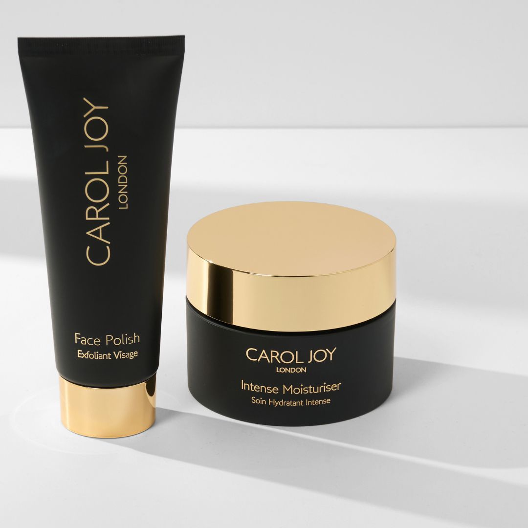 The Carol Joy London Face Polish to the left of the Carol Joy London Intense Moisturiser, against a plain white background