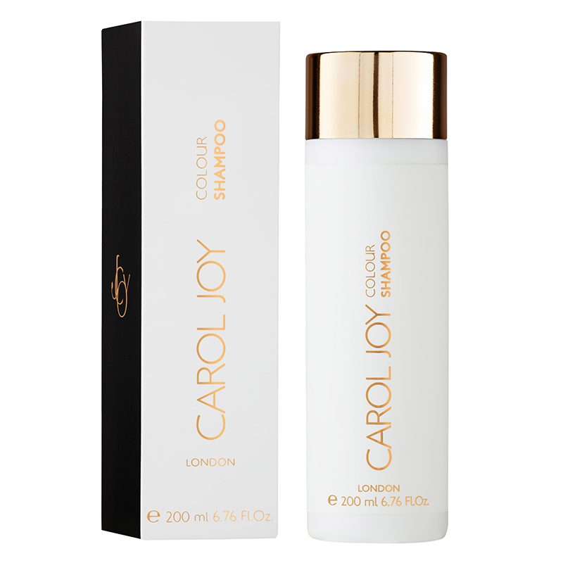 The Carol Joy London Colour Shampoo against a plain white background, its packaging to the left