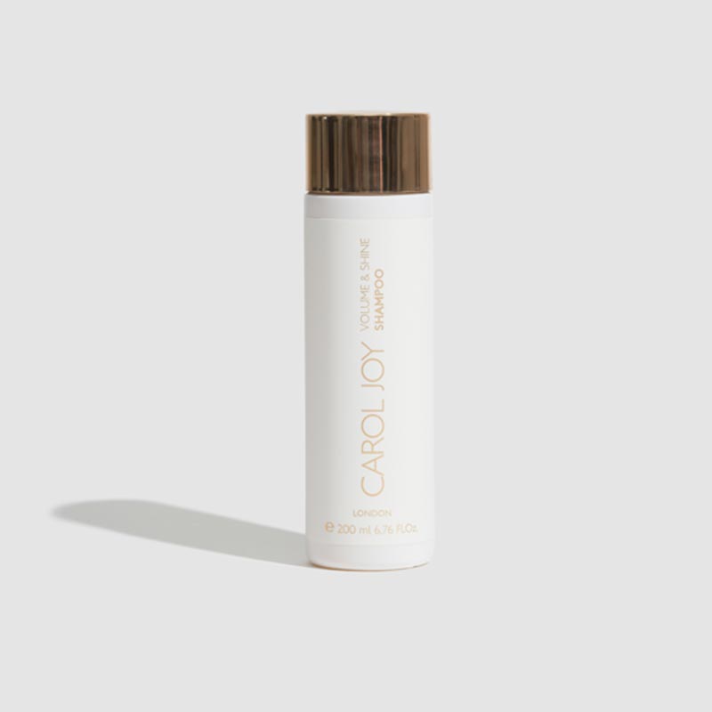 The Carol Joy London Volume And Shine Shampoo against a plain white background